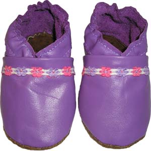 A variation of our classic design, these shoes have a floral ribbon trim. Also available without a ribbon by request.
