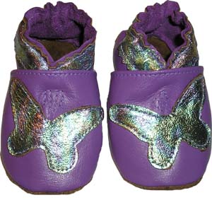 A vibrant darker lilac shoe with a flashy butterfly.
