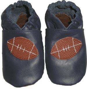 A sporty Blue shoe with a football made from genuine football leather.