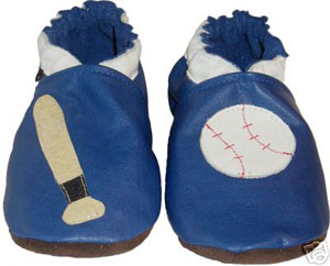 Get ready for baseball season in this blue crib shoe with baseball bat and ball.
