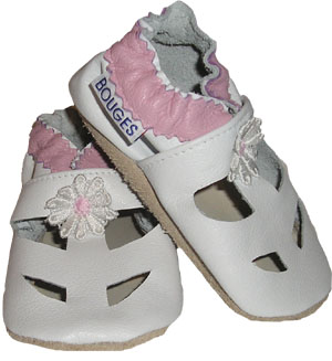 A spring time best seller. Soft white leather with a pink ankle strap.