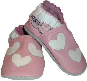 Light pink crib shoe with white hearts and lace ankle trim is perfect for your little sweetheart.